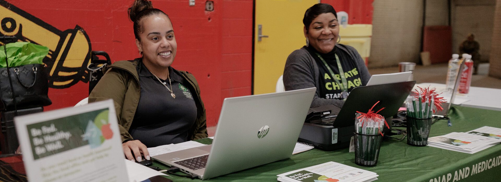 Smiling staff members at the Greater Chicago Food Depository.
