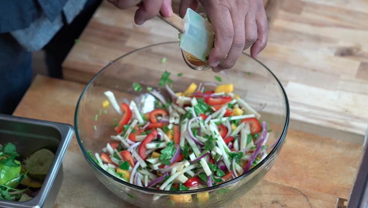 Mango jicama salad being prepared