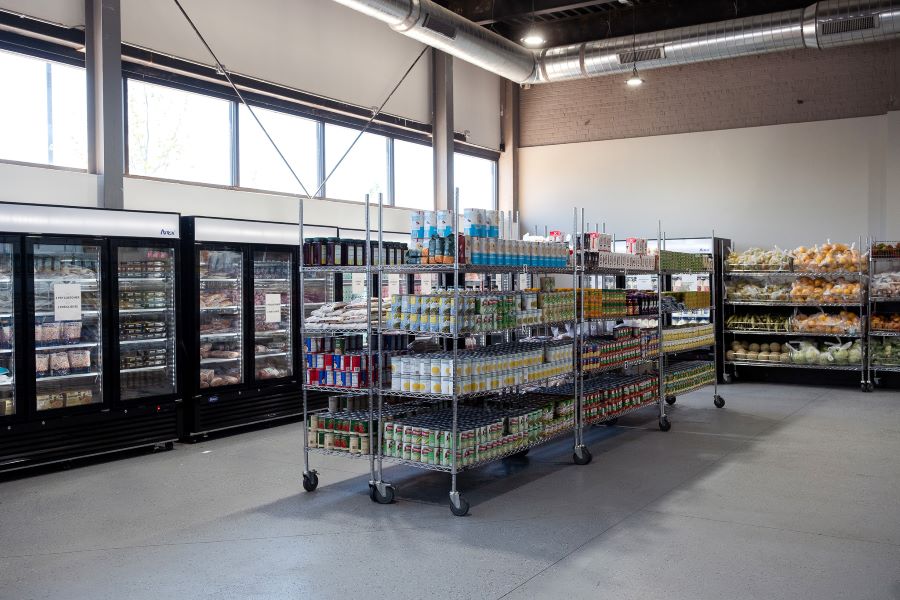 Racks and refrigerators filled with food.